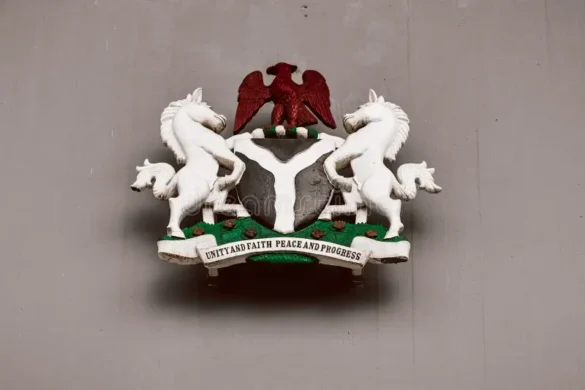 Nigeria coat of arms meaning showing official national emblem with black shield, red eagle, white horses, and green wreath representing unity and strength